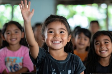 Fototapeta premium A cheerful girl raises her hand with a bright smile among her classmates in a warm classroom setting, embodying eagerness and enthusiasm for learning.