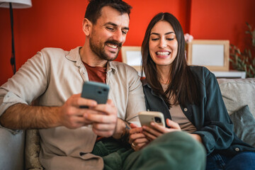 couple enjoy and use a mobile phone for entertainment and conversation