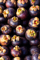 Organic mangosteens in the traditional Colombian market - Garcinia mangostana.