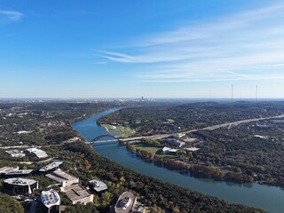 Fototapeta premium The Pennybacker Bridge and Lake Austin through the rolling hills