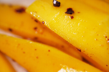 Close up of fresh Thailand mango mixed with dried chili,sugar and salt