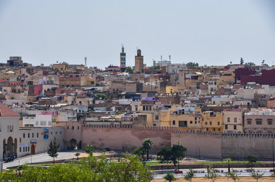 A wide shot of the Imperial City of Meknes, a hilltop city in northern Morocco with Spanish-Moorish style architecture.