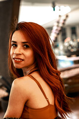Obraz premium An intense gaze that tells stories without words, illuminated by warm and captivating tones.