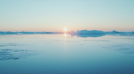 Obraz premium Arctic Sunset Over Icy Ocean
