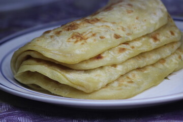 A close-up of the traditional Moroccan flatbread known as Msemmen or Msemen