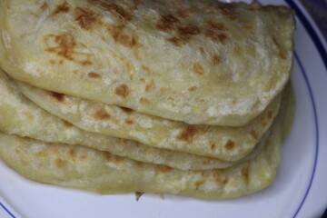 A close-up of the traditional Moroccan flatbread known as Msemmen or Msemen