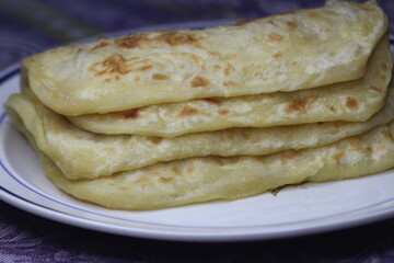 A close-up of the traditional Moroccan flatbread known as Msemmen or Msemen