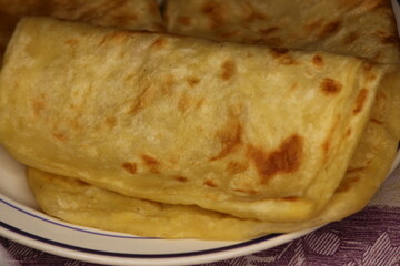 A close-up of the traditional Moroccan flatbread known as Msemmen or Msemen