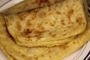 A close-up of the traditional Moroccan flatbread known as Msemmen or Msemen