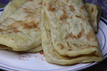 A close-up of the traditional Moroccan flatbread known as Msemmen or Msemen