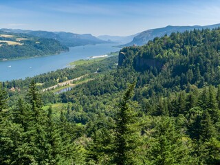 Panoramic view of the Columbia River Gorge. Highway winds through lush forests. Scenic landscape. Corbett, Oregon, USA
