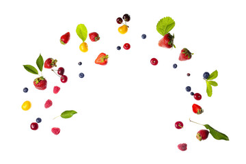 Flying different fresh berries with mint on white background