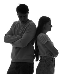 Silhouette of upset couple after quarrel on white background. Domestic violence concept