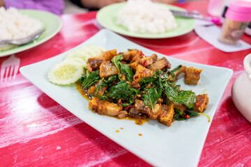 Savory Stir-Fried Dish with Fresh Vegetables and Herbs on Plate
