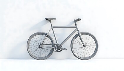 Naklejka premium Sleek Grey Bicycle Against a Minimalist White Wall: A Modern, Clean Aesthetic