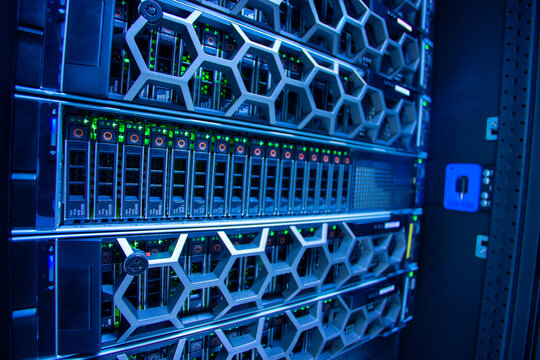 High-Tech Data Center with Network Servers and Glowing Lights - Powered by Adobe