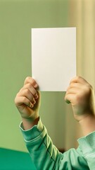 man holding a blank business card