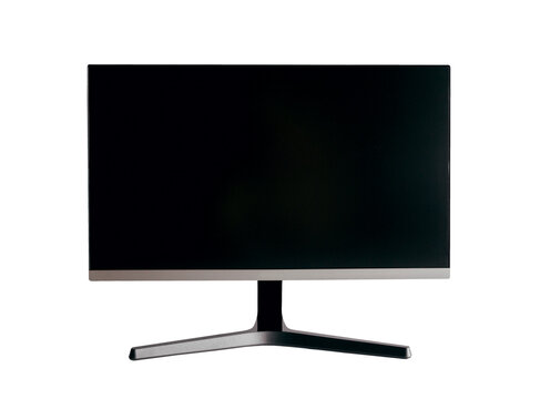 A black computer monitor on a white table. Mock up for design, teplate. Stylish minimalist interior. Gray background.