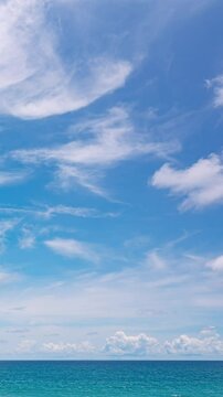 Timelapse sun clouds over sea nature environment,Blue sky background in vertical