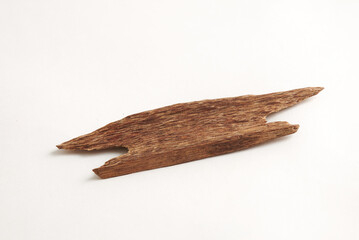 Raw Agarwood Chip isolated on white background. Oud for Aromatherapy and Perfume Making. Full depth of field