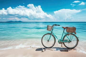 Obraz premium A bicycle rests on the beach, positioned close to the gentle waves of the water, showcasing a serene coastal scene.