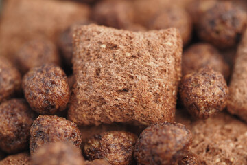 Chocolate cereal pieces in a close-up view for breakfast enjoyment