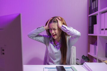 a female supervisor is working overtime at the company stressed because there are many documents that need to be solved in time, tired, businesswoman, deadline, overwork, exhausted