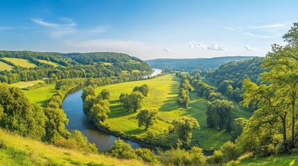 lush greenery and winding river against a clear blue sky