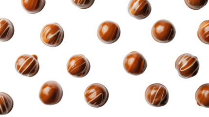 Caramel chocolate candies falling on transparent background