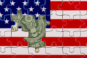 Fragment of a 1 US dollar bill with the Great Seal on the background of the US flag from puzzles