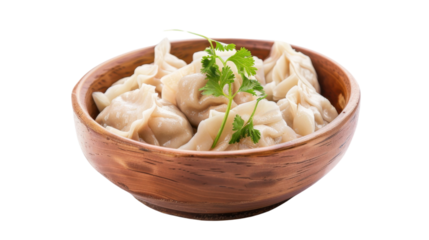 Steamed dumplings served in wooden bowl with coriander garnish on transparent background