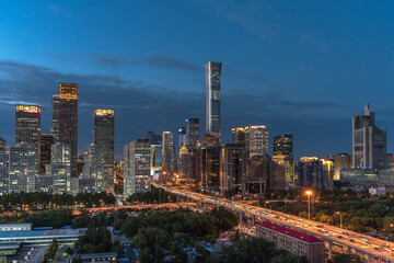 Urban landmarks in Beijing, China: The landscape of China World Trade Center and viaducts under the...