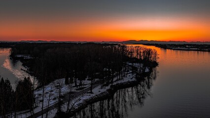 Delta BC Canada - February 11th 2025: Sunset at Deas Island Regional Park waterfront 