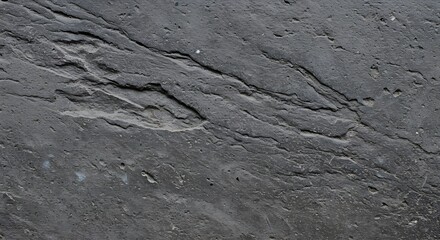 Rough Stone Surface Texture with Gray Tones and Visible Crevices