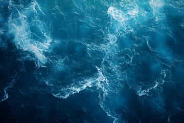 Aerial View of Azure Ocean Waters with White Foaming Waves Creating Mesmerizing Patterns and Textures, Showcasing the Raw Beauty and Serenity of the Open Sea