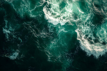 Obraz premium Aerial view of the mesmerizing ocean waves, capturing the turbulent beauty and dynamic energy of nature's powerful display from above