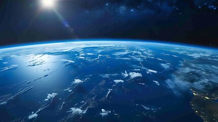Obraz premium Stunning Aerial View of Earth Showing Oceans, Clouds, and Sunlight from Space at Dawn