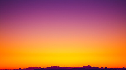 Fototapeta premium A beautiful sunset with a purple sky and a mountain in the background