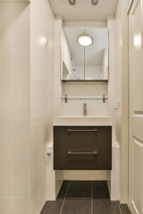 A contemporary bathroom design featuring sleek lines, neutral colors, and modern fixtures, creating a clean and spacious atmosphere for relaxation.