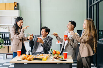 Lively office party with coworkers celebrating, enjoying pizza and drinks, and fostering team spirit
