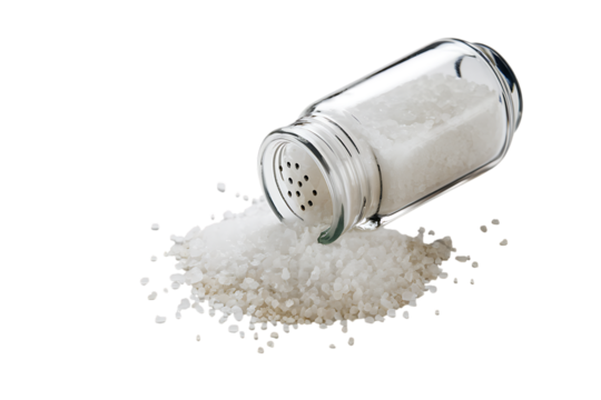 Glass Salt Shaker Spilling Granular White Table Salt Crystals