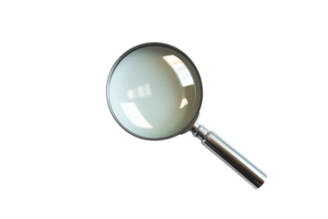 A closeup of a silver magnifying glass with a clear lens. Light reflects on the surface creating subtle highlights. The background is black.