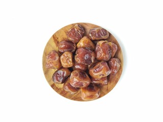 Date fruits on plate isolated on white background, Typical Muslim food during the month of Ramadan 