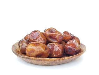 Obraz premium Date fruits on plate isolated on white background, Typical Muslim food during the month of Ramadan 