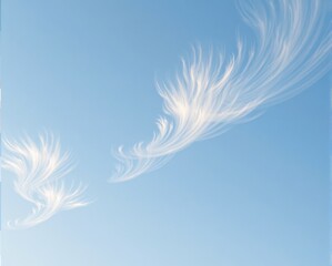 A serene sky showcases wispy clouds resembling delicate feathers against a soft blue backdrop.