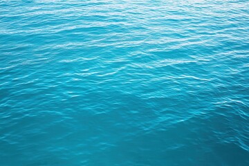 Obraz premium Calm ocean surface, gentle waves, aerial view, background sky