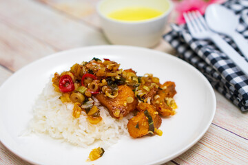 DEEP fried fish with herb & spicy sauce with rice