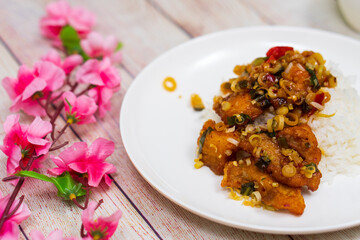 DEEP fried fish with herb & spicy sauce with rice