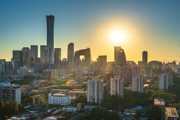 Fototapeta premium In the early morning in Beijing, China, urban landmarks under the rising sun