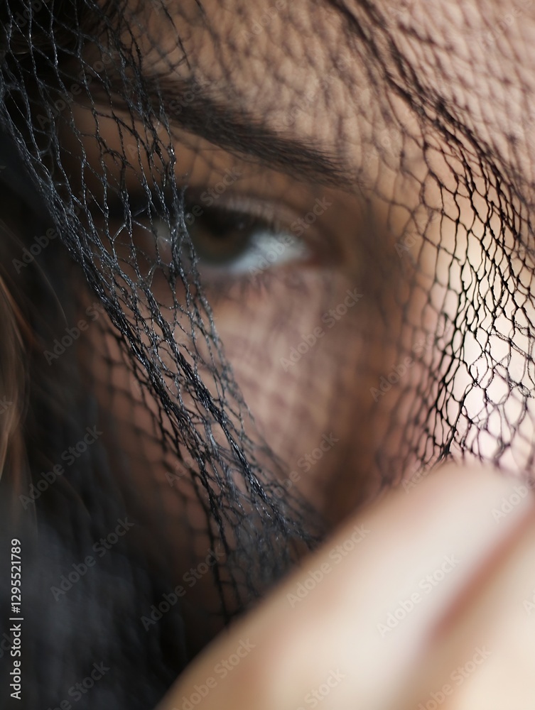 Aufkleber Close up of a woman's eye partially hidden behind a black netting creating a mysterious vibe : Generative AI